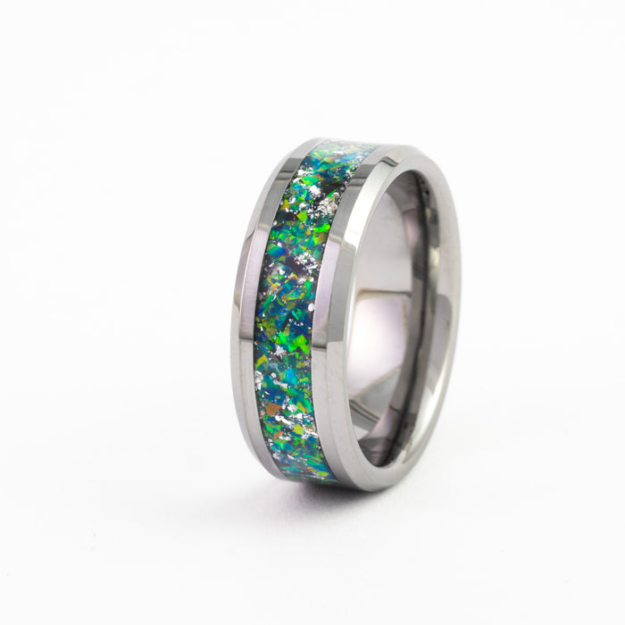 Silver tungsten ring with vibrant multicolored opal inlay on white background