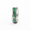 Close-up of a silver tungsten ring with colorful opal inlay on a white background.