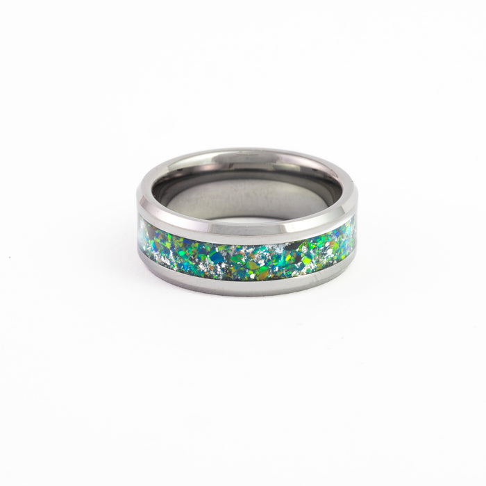 Silver tungsten ring with iridescent green-blue opal inlay, top-down view on white background.