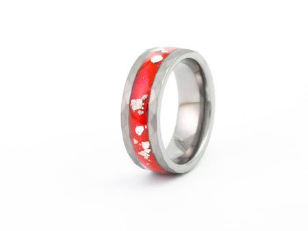 Hammered silver tungsten ring with red opal inlay on white background.