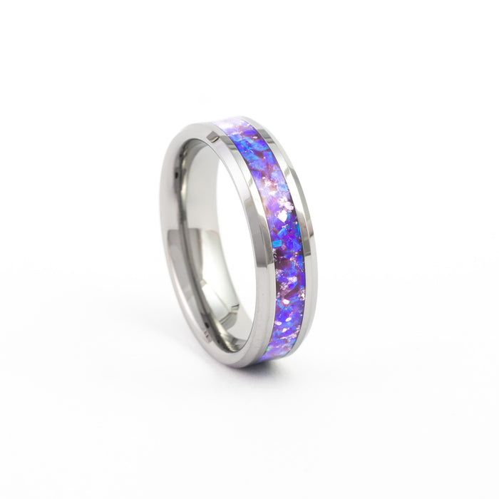 Detailed studio shot of the Tungsten Carbide Wedding Band featuring a striking purple and blue synthetic opal inlay.