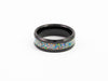 Top view of the Black Ceramic Ring showcasing the wide multi-color fire opal flake inlay and the detailed milgrain edges.
