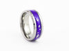 Angled studio shot of the Silver Tungsten Carbide Ring with stunning purple resin and silver leaf flake inlay.