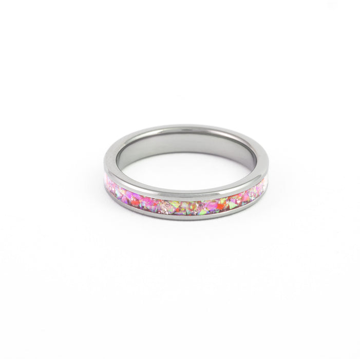 Top view of the slim Tungsten Ring showcasing the narrow pink synthetic fire opal inlay on white background.