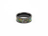 Top view of the Black Ceramic Ring showcasing the wide dark nebula-style multicolored fire opal inlay and silver flakes.