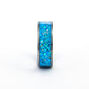 Side view of the Gunmetal Tungsten Carbide Ring detailing the wide, vibrant blue fire opal inlay.
