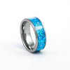 Angled studio shot of the Gunmetal Tungsten Carbide Ring with wide, vibrant blue fire opal inlay.