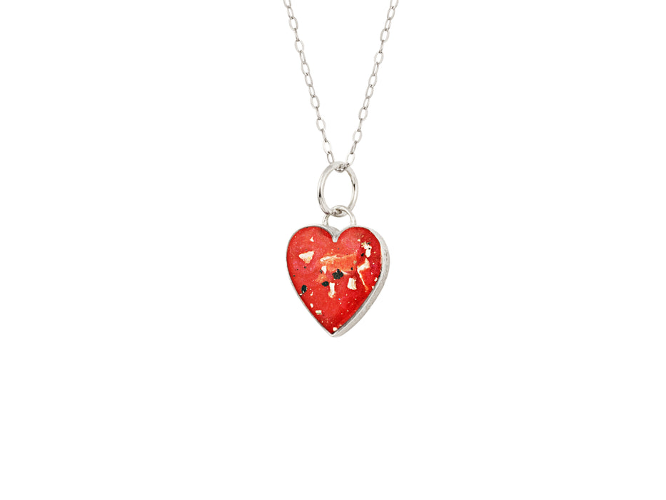 Sterling silver heart pendant necklace with red resin inlay and gold flake accents.