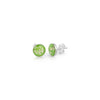 Pair of sterling silver stud earrings featuring round bright green opal resin inlays with the posts clearly visible.