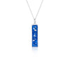 Sterling silver chain necklace with a rectangular bar pendant featuring bright blue resin and internal silver flake accents.