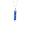 Sterling silver chain necklace with a rectangular bar pendant featuring bright blue resin and internal silver flake accents.