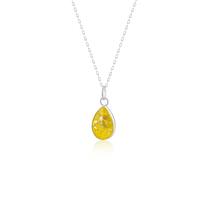 Sterling silver chain necklace with a pear-cut teardrop pendant featuring a yellow resin inlay.