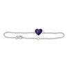 Sterling silver chain bracelet featuring a central heart charm with deep purple resin inlay and internal gold flake accents.