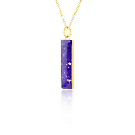 Gold-plated chain necklace with a rectangular bar pendant featuring deep purple resin and internal gold flake accents.