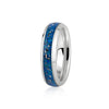 Sterling silver band ring featuring a continuous inlay of bright blue opal resin and scattered silver flakes.