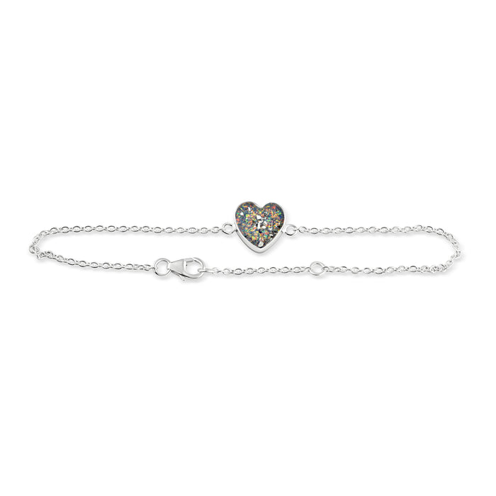 Silver chain bracelet featuring a heart-shaped charm inlaid with multicolored opal resin on a white background.