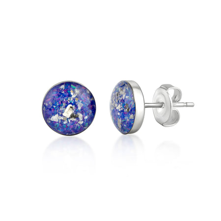 Pair of sterling silver stud earrings featuring round blue and purple opal resin inlays with internal silver flakes.