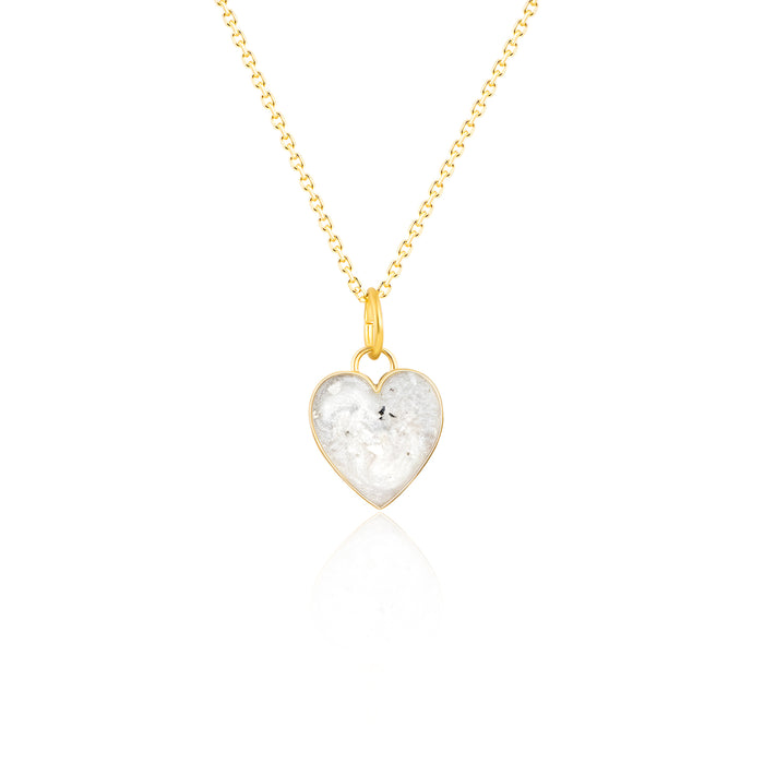 Gold-plated chain necklace with a heart-shaped pendant featuring white/gray resin inlay.