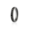 Thin black band ring featuring a continuous inlay of black resin with scattered white and silver flakes.