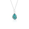 Sterling silver chain necklace with a pear-cut teardrop pendant featuring vibrant teal blue resin and internal silver flake accents.