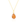 Gold-plated chain necklace with a pear-cut teardrop pendant featuring vibrant orange resin and internal gold and silver flake accents.