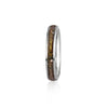 Thin sterling silver band ring featuring a continuous inlay of brown resin with gold and silver flake accents.