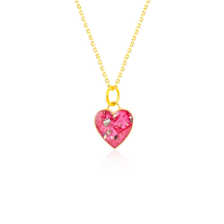 Gold-plated chain necklace with a heart-shaped pendant featuring vibrant pink resin and internal silver flake accents.