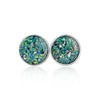 Pair of sterling silver stud earrings with round blue-green opal resin inlays and silver flakes.