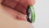 360-degree video shot of the Black Ceramic Ring with bright lime green resin inlay.
