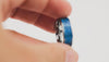360 view showing the Gunmetal Tungsten Ring rotating, detailing the wide, vibrant blue fire opal inlay.
