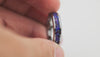 360-degree video view of the Tungsten Carbide Ring showcasing the shimmering purple and blue synthetic opal inlay.